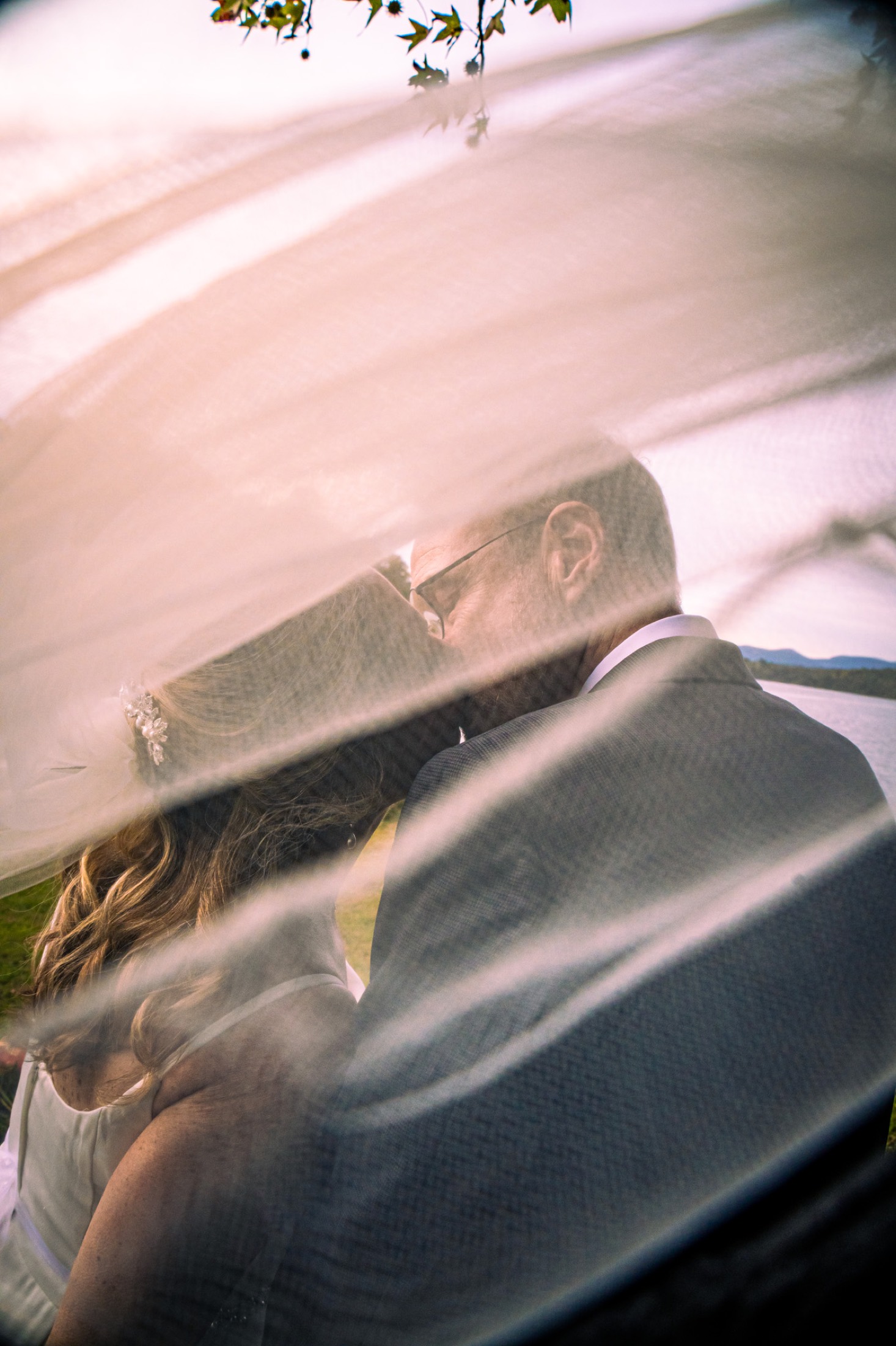Bride getting ready in soft window light